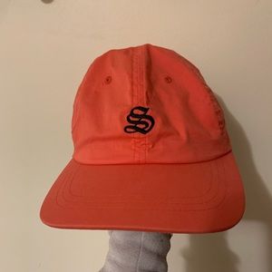 Stussy cap coral color